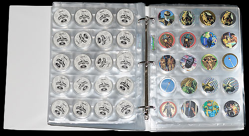 Open folder showing Pogs stored in Collectors Wallets / Storage Sleeves