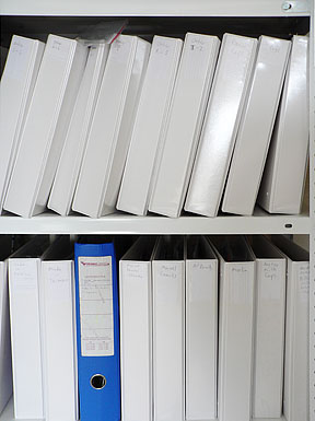 Photo of folders on a shelf